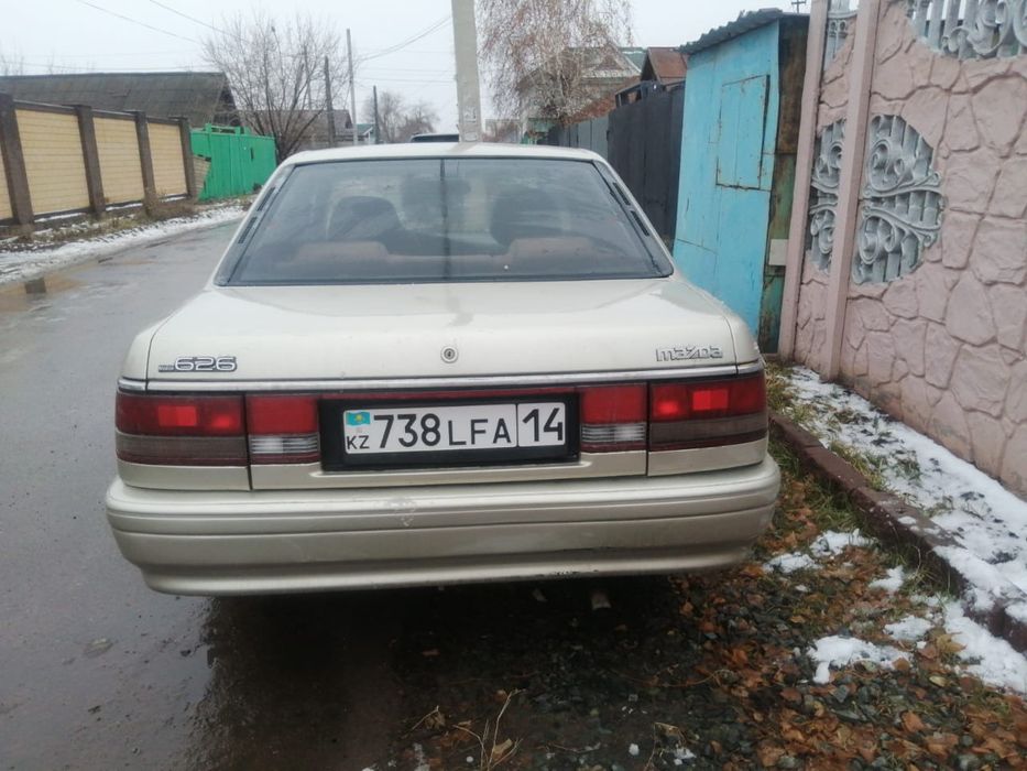 Автомобиль Мазда 626