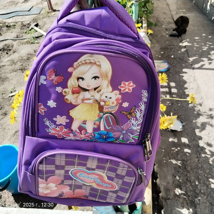 Портфель девочке.