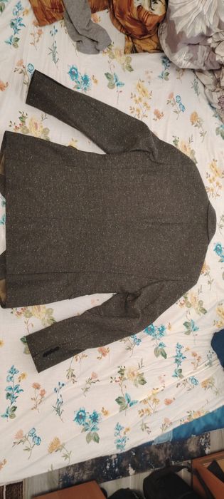 Sacou de costum nepurtat