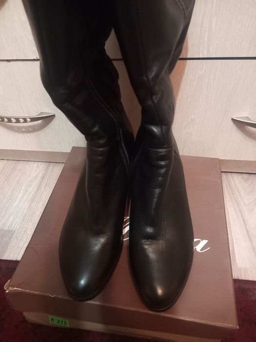 Продам новые сапоги