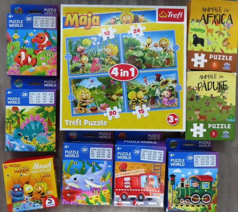 30 puzzle-uri + alte jucării diverse, plus 3 cadouri (3+ ani)