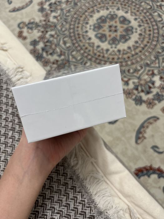 Новый телефон, запечатанный.