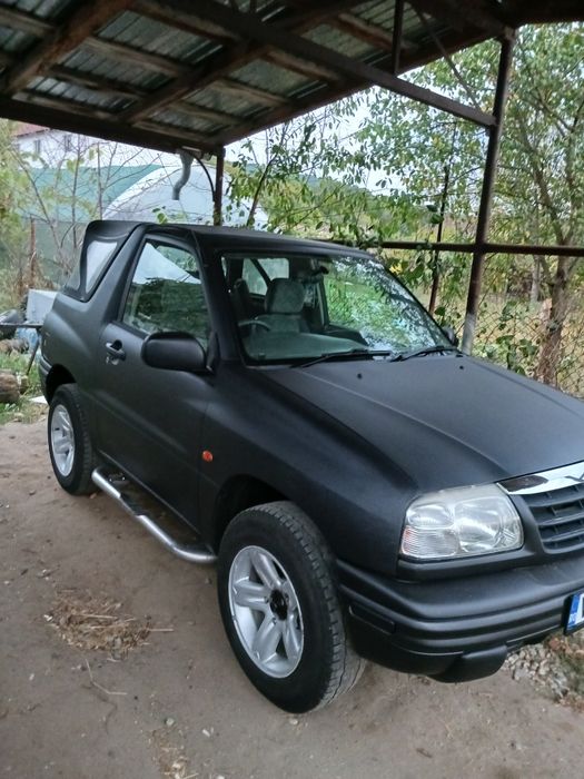 Suzuki Grand Vitara sau schimb cu mașina de teren cu bena