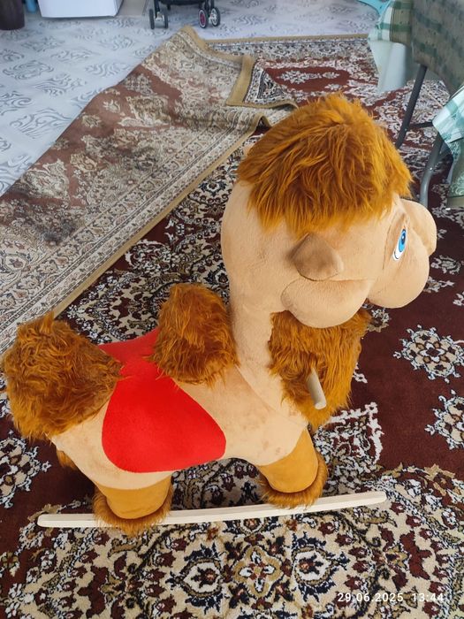 Продам игрушку качалку верблюд