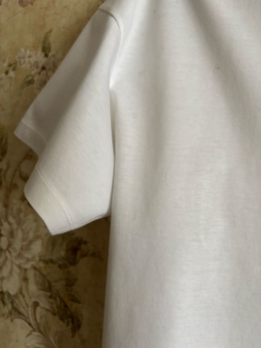 Майка Uniqlo белая.