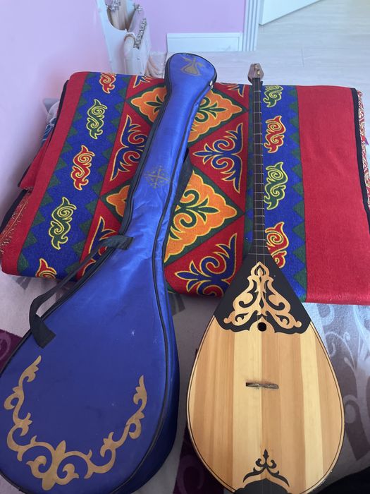 Прадется домбыра