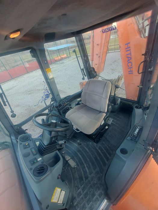 Buldoexcavator devinzare