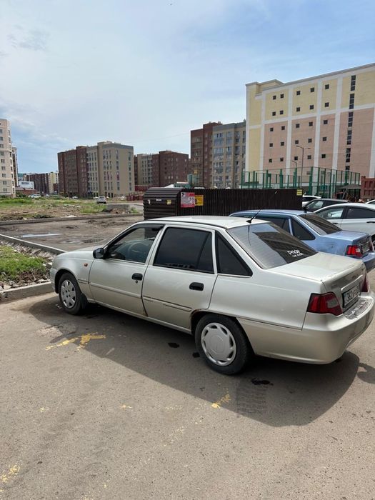 Daewoo Nexia серебристый