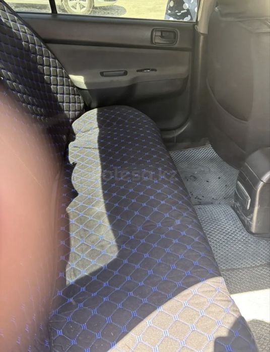 Машина Mitsubishi Lancer