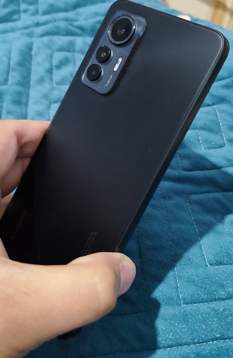 Xiaomi 12 Live кепілдік беремін