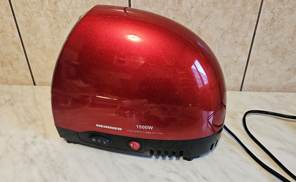 Masina de tocat Heinner