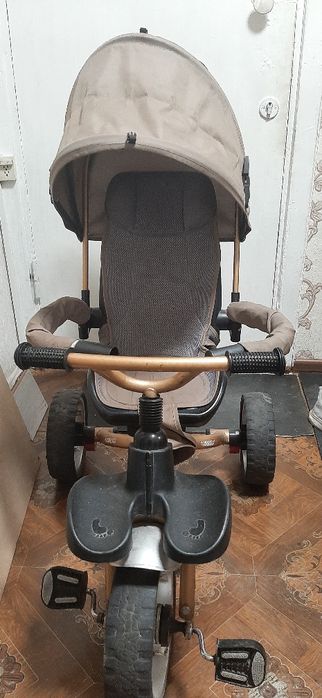 Велосипед с родительской ручкой.