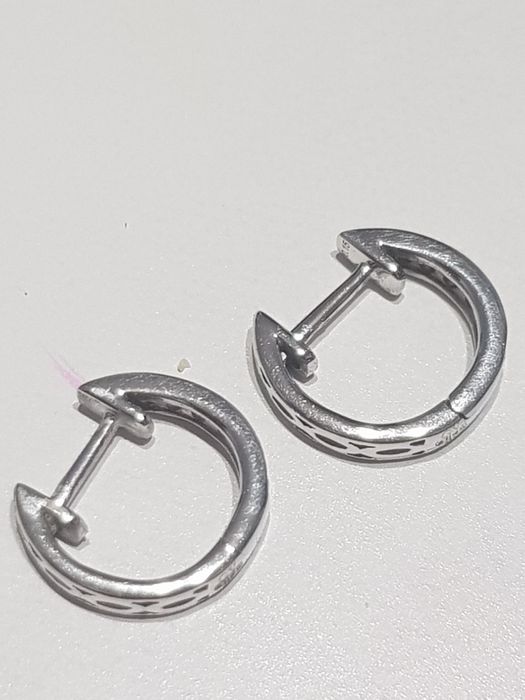 Cercei aur alb 18k cu 14 diamante