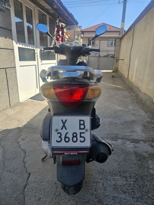 Скутер  Хонда 125i