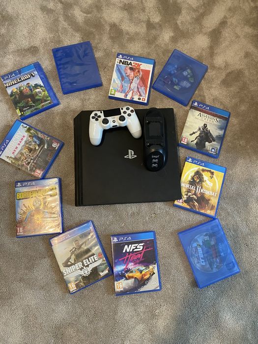 Vand ps4 pro +Maneta alba+10 jocuri si incarcator