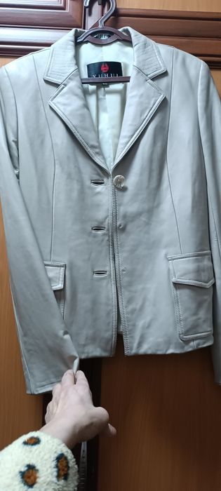 Сотаман пальто ва кожаный пиджак