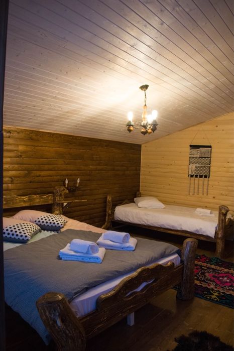 Cabana rustic cu 4 camere,ciubar si sauna