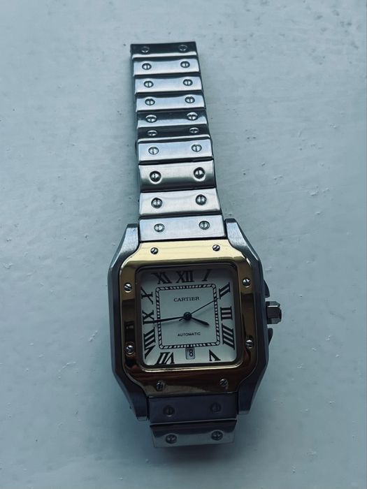 Часы от бренда CARTIER