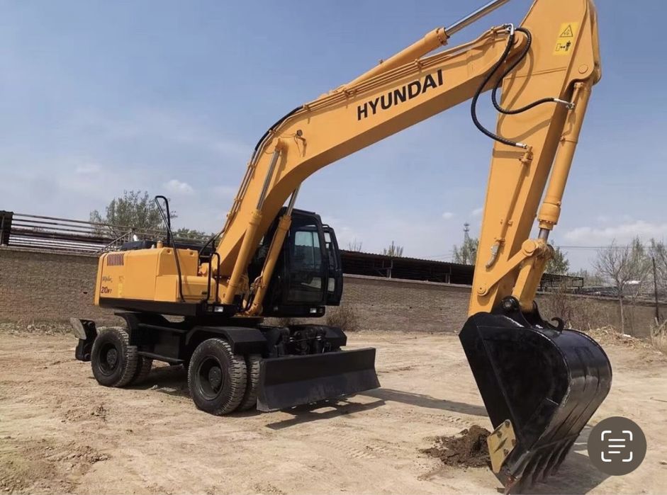 Экскаватор.Услуги колесных Экскаваторов