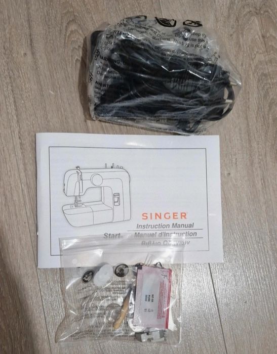 Mașina de cusut singer 1306