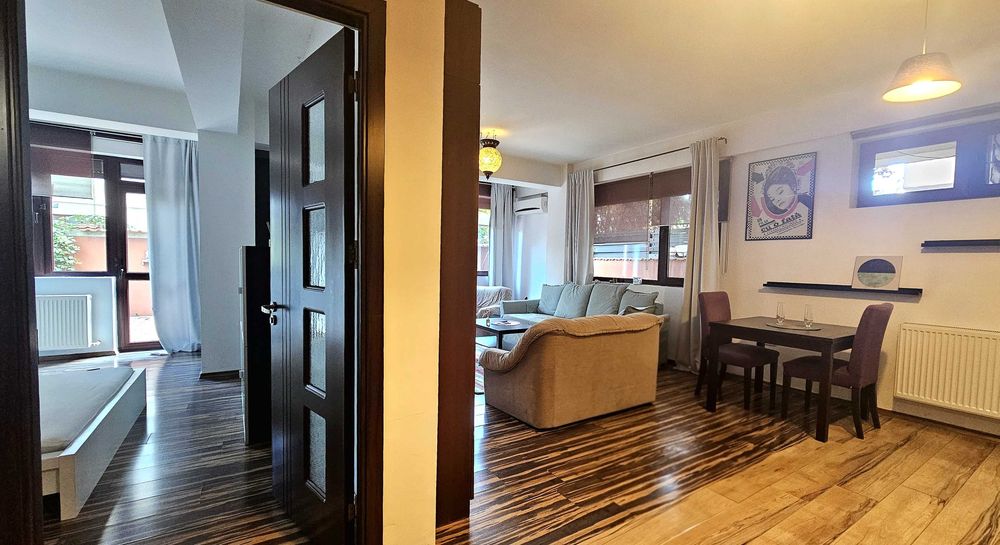 Inchiriez apartament cu curte