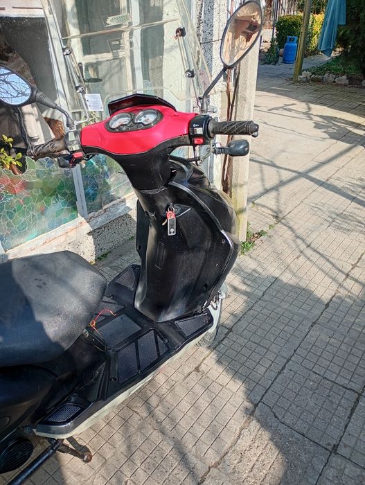 Скутер Sukida...