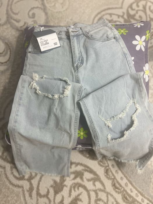 Новый рванный джинси продам