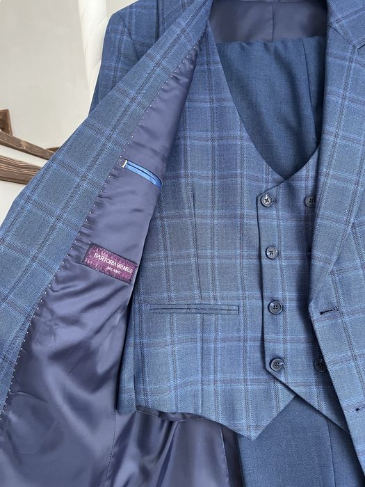 Костюмы 48 размер