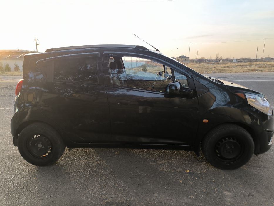 Spark 2011 qora  gaz+ benzin