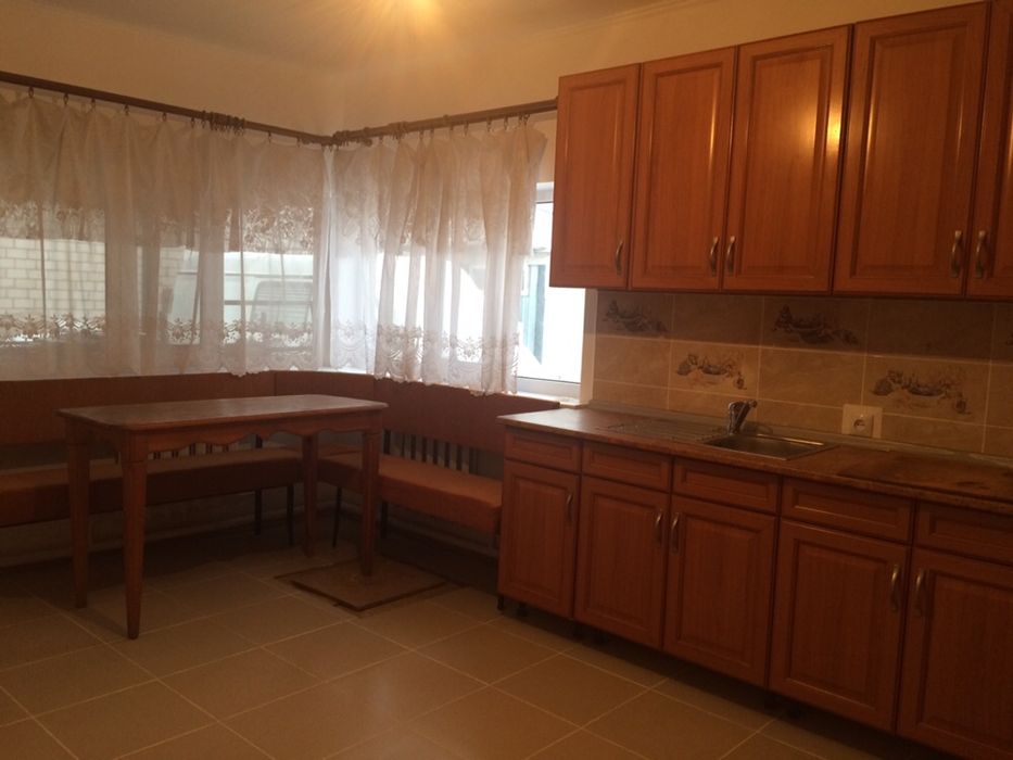 Действующее  ЛПХ в городе + два дома.