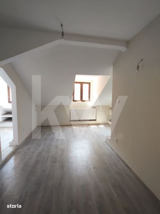 Casa cu 4 garsoniere si cu demisol