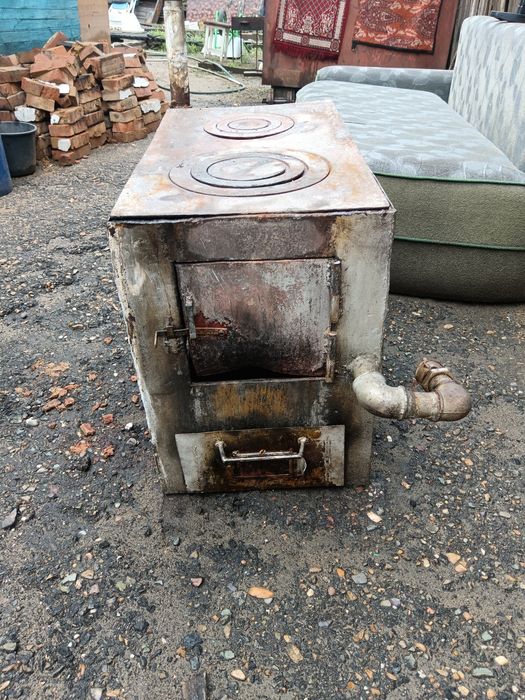 Продам печь б/у на твёрдом топливе