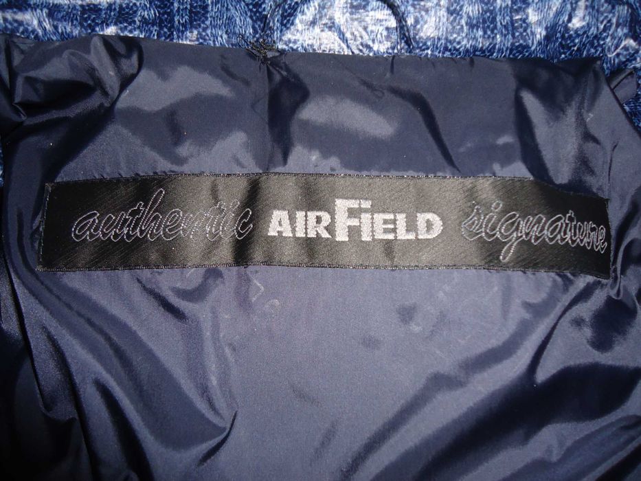 Продам Фирменный пуховик