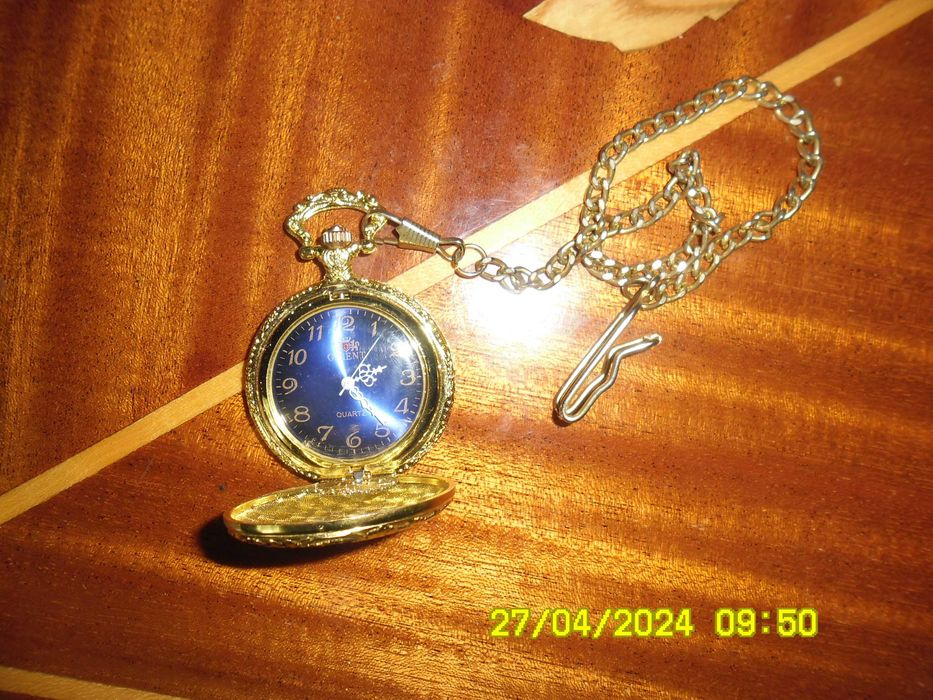 Продам:Монеты значки часы позолоченные.