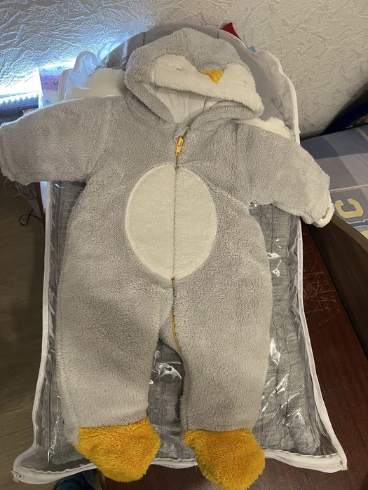 Продам теплый комбинезон.