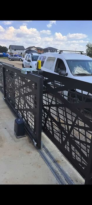 usi garaj sectionale/tip rulou,automatizari porti,usi multifunctionale