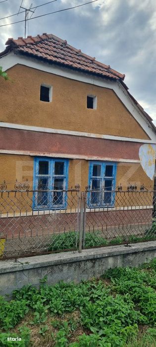Casa cu doua corpuri
