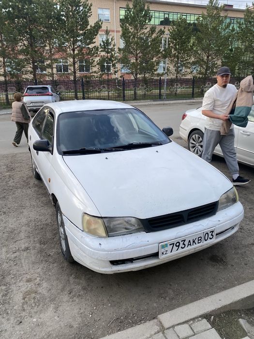 Тойота карина е