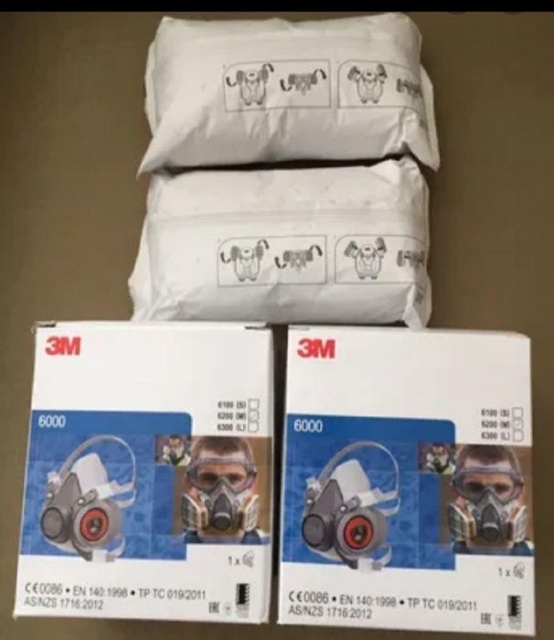 Masca de protectie : praf fum gaze chimicale lacuri vopsele mirosuri .