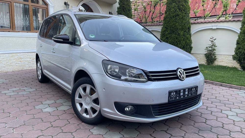 VW  Touran 2012, 7 locuri**Garantie**Rate**