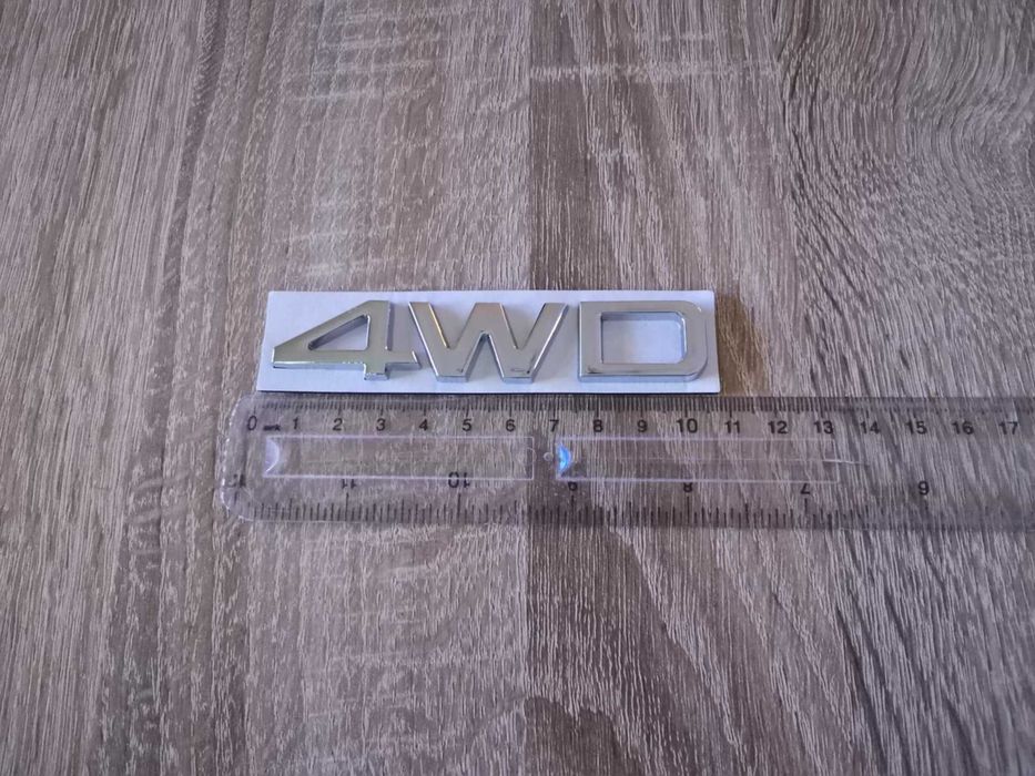 сребриста емблема Kia 4WD