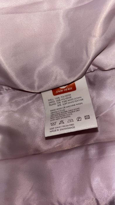 Розовая дутая куртка