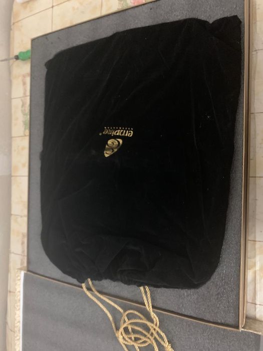 Настольная игра Тоғызқұмалақ