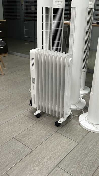 Электрические радиаторы и вентиляторы-башни