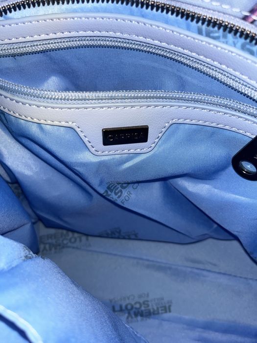 Чанта Carpisa limited collection by Jeremy Scott