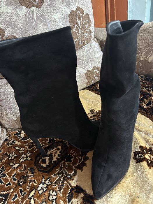 Продам новые сапоги