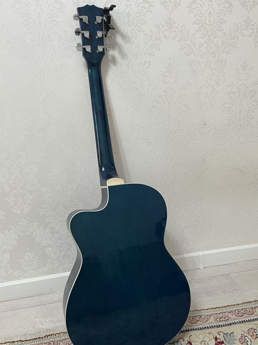 Гитара адасио в комплекте кападастер