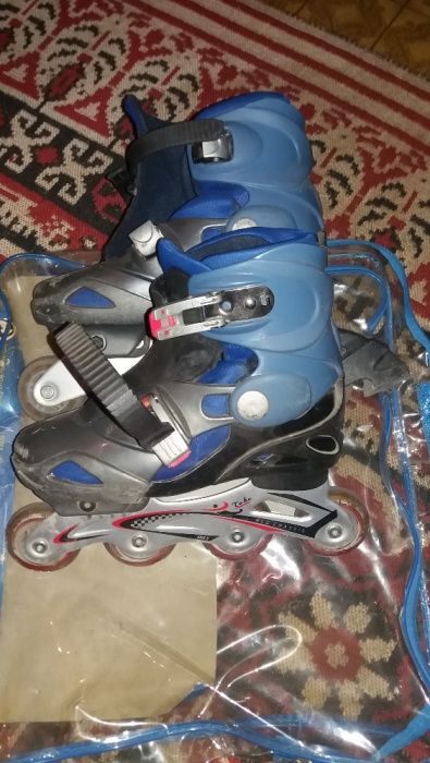 Роликовые коньки