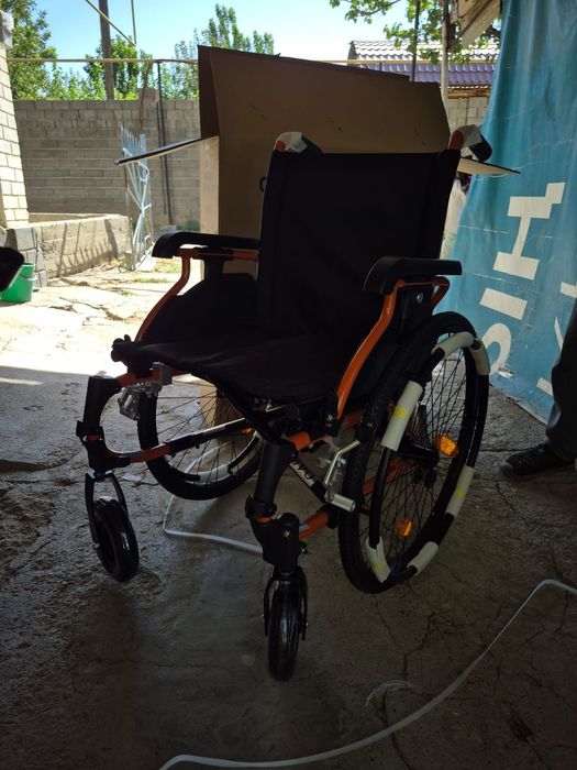 Коляска для инвалидов и ходунки