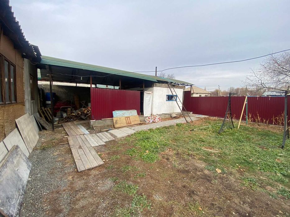 Дом, улица Калиева, Танат Империя